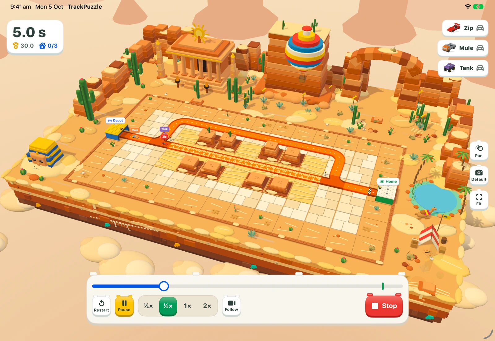 Track Puzzle’s Desert world during a run, with a track winding past sandstone ruins and a pyramid